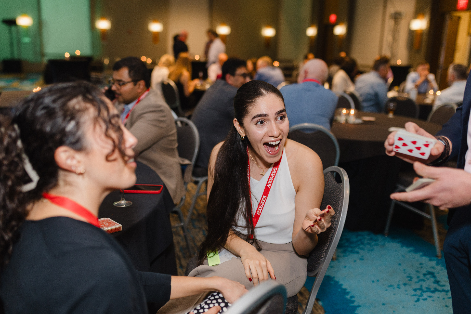 Guest reacting with amazement during close-up magic